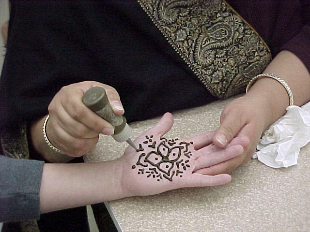 India Westbrooks henna hand tattoo