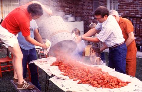 A Cajun family enjoys a crawfish boil in Breaux Bridge, St. Martin Parish.